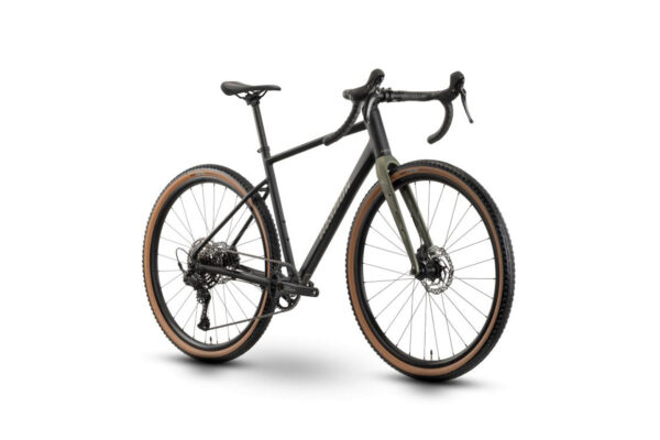 Black gravel bike with tan-wall tires, drop handlebars, and an olive rigid front fork suitable for off-road riding